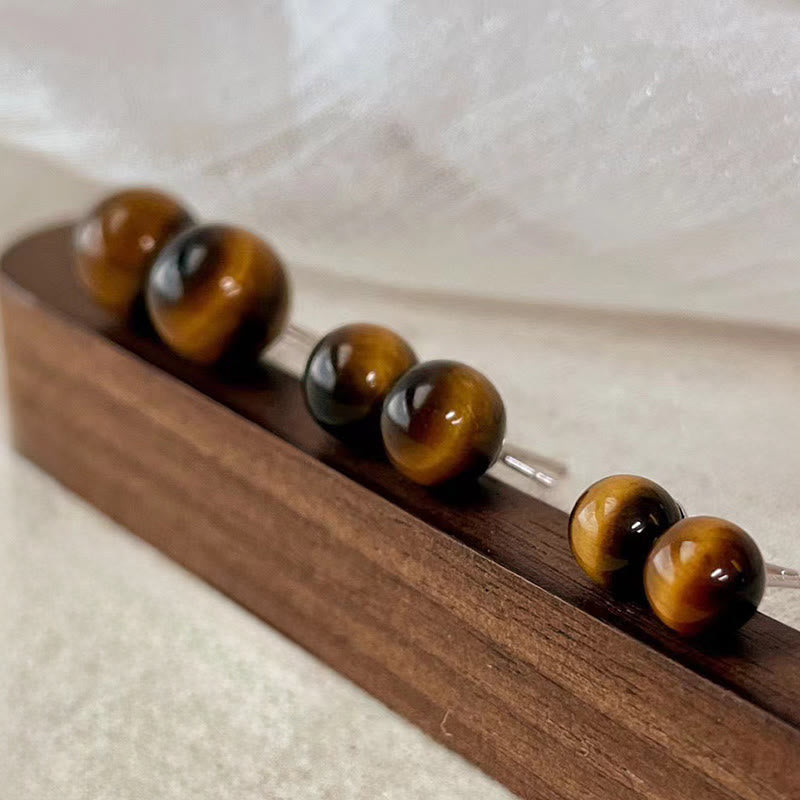 WORN WITHIN Simple Tiger Eye Retro Round Protection Stud Earrings