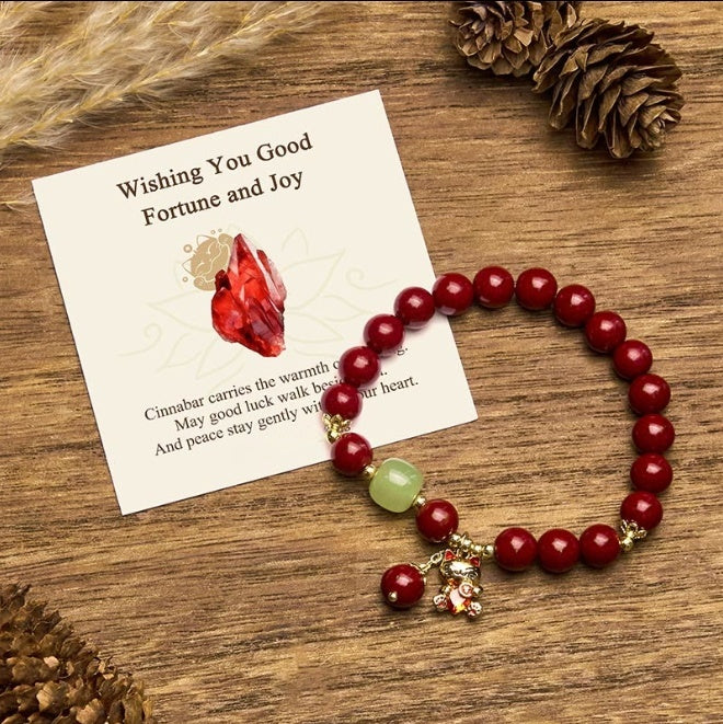 Cinnabar Cat Charm Bracelet